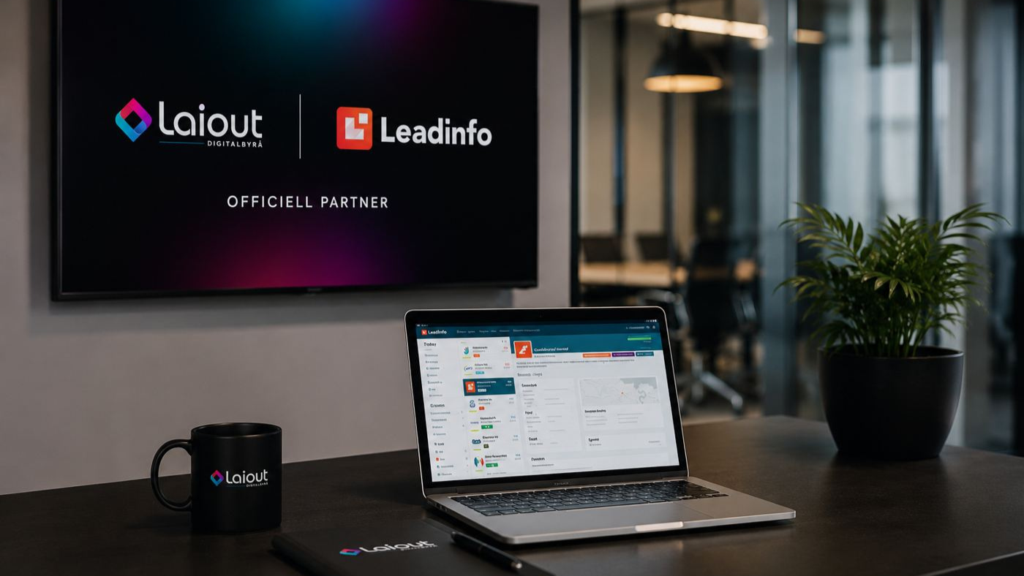 Modern företagsmiljö med Laiout Digitalbyrå och Leadinfo som officiella partners på skärm i konferensrum.
